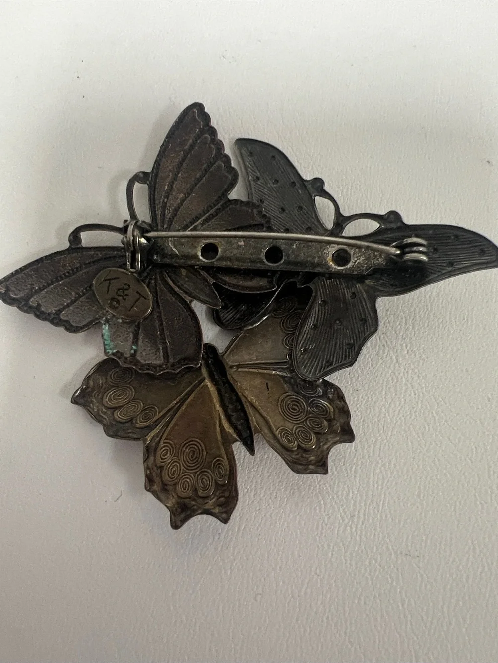 Vintage K & T brooch. Copper, silver, and bronze tone butterfly brooch
